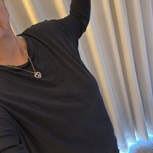 Lululemon Ladies Back in Action Black Long Sleeve NWT Still in Package Quality